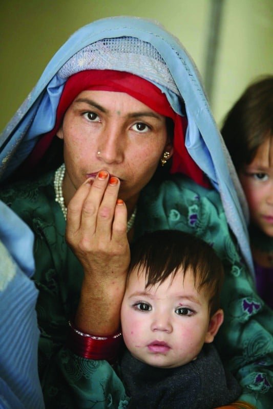 Waiting for treatment at Esteqlal Hospital, Kabul. about 400,000 Afghans across the country are deprived of access to basic health services due to insecurity. Photo: Manoocher Deghati/IRIN