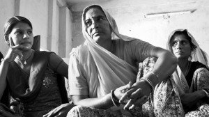 The President of the Lakshminidi Women's MicroFinance Cooperative Society in Niwai, Rajasthan, with leading members of the society. Photo: Austin Yoder.