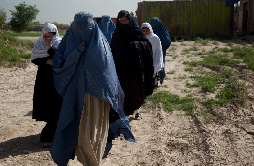 Photo: Women going to a community meeting in Bagram, Afghanistan. Courtesy ISAF Public Affairs