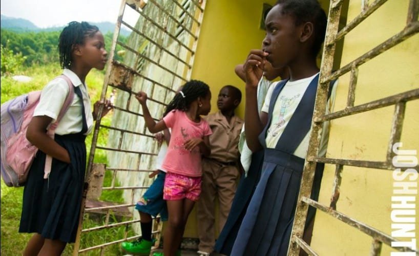 Young Jamaican with the burden of debt (Photograph by- Josh Hunter)